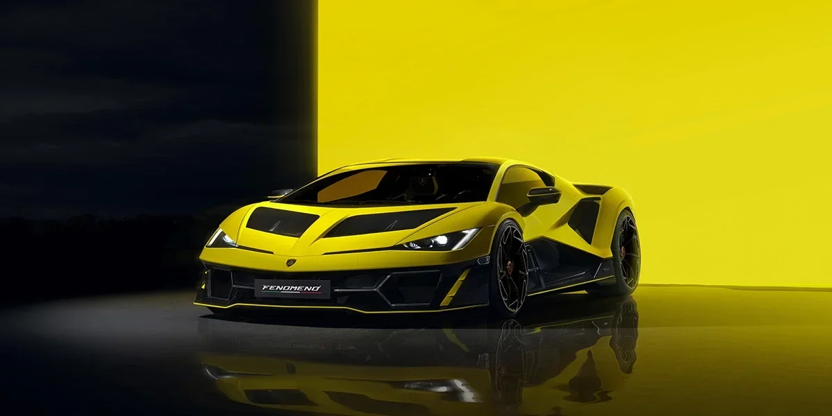 Front angle Lamborghini Fenomeno yellow supercar with aggressive LED headlights and carbon fiber details.