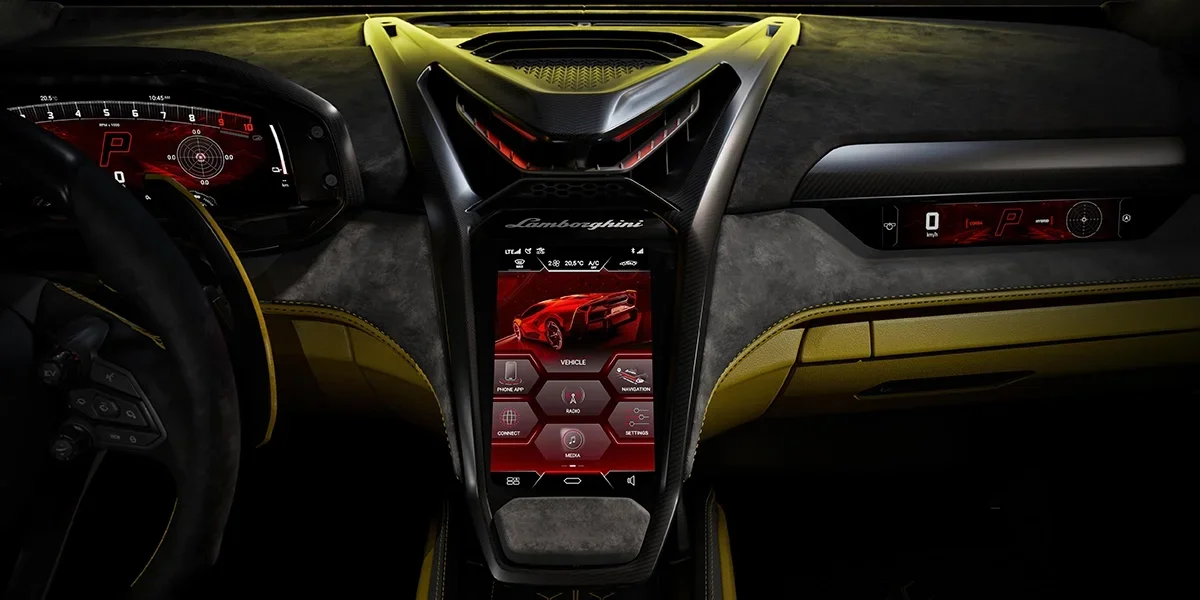 Close-up of Lamborghini Fenomeno center console with touchscreen infotainment and digital displays.