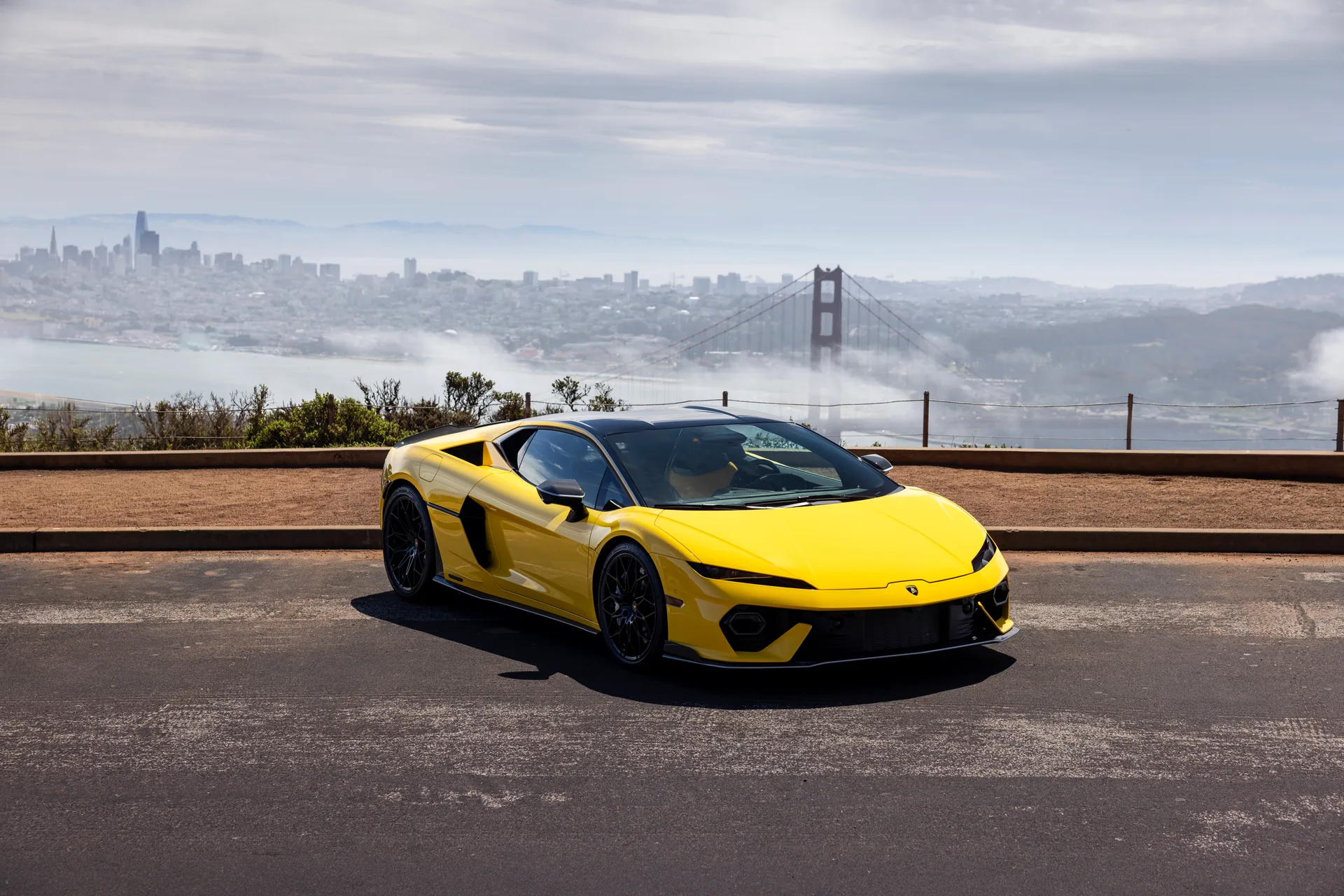 Yellow Lamborghini Temerario overlooking the Golden Gate Bridge
